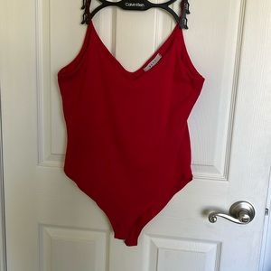 Red plunging neckline body suit